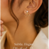 Pearl Bow Stud Earrings